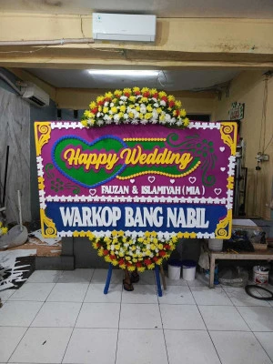 Papan Bunga di Sumur