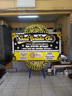 Papan Bunga di Sumur